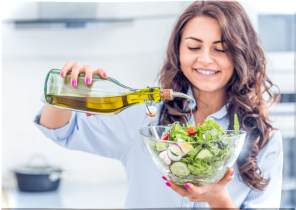 Woman preparing a salad. 