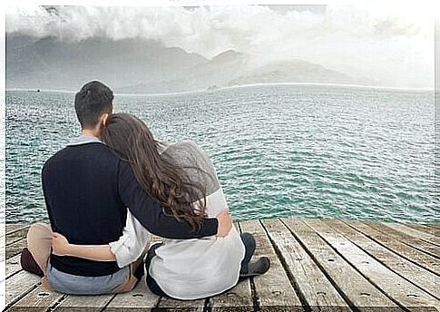 couple at the water's edge