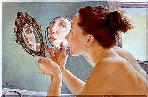 woman in front of a mirror