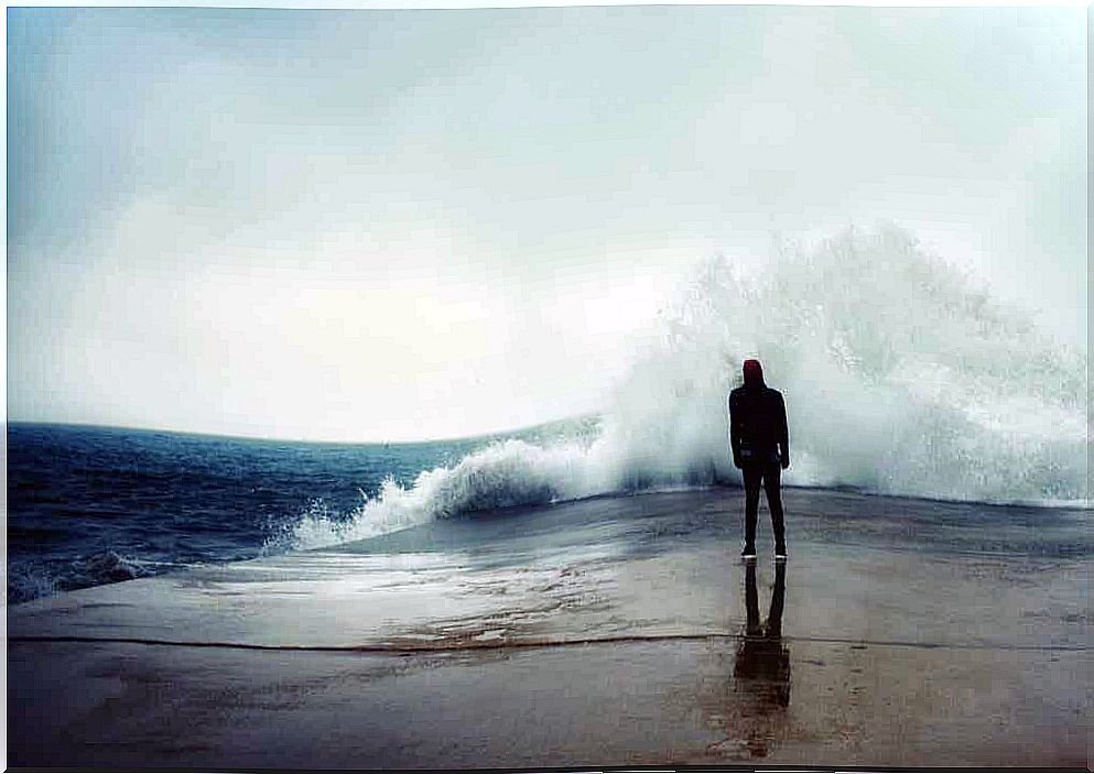 Man facing the sea.