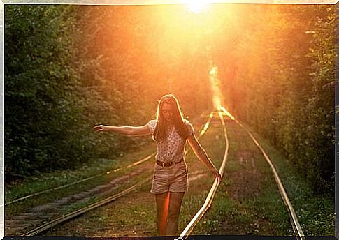 woman on the rails having retreated to advance